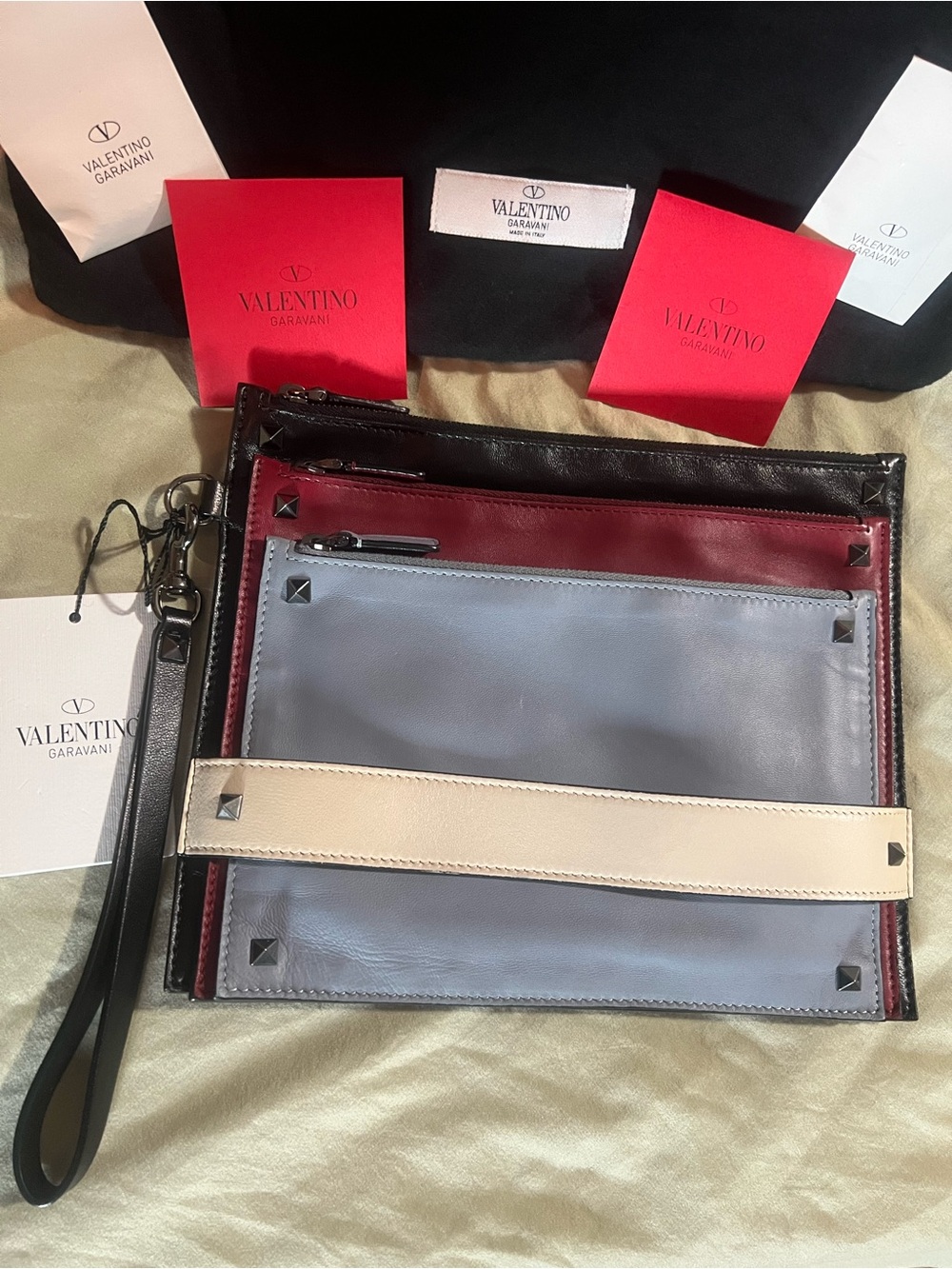 Valentino Garavani Rock Stud Triple Zip Clutch, with inclusions, see description